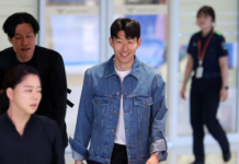 ‘생애 첫 우승’ 손흥민 금의환향…웃으며 팬들에 손인사